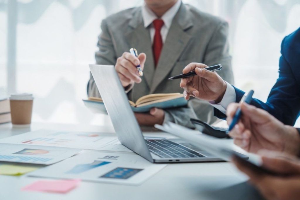 Directors following board meeting protocol from agenda to action in a boardroom