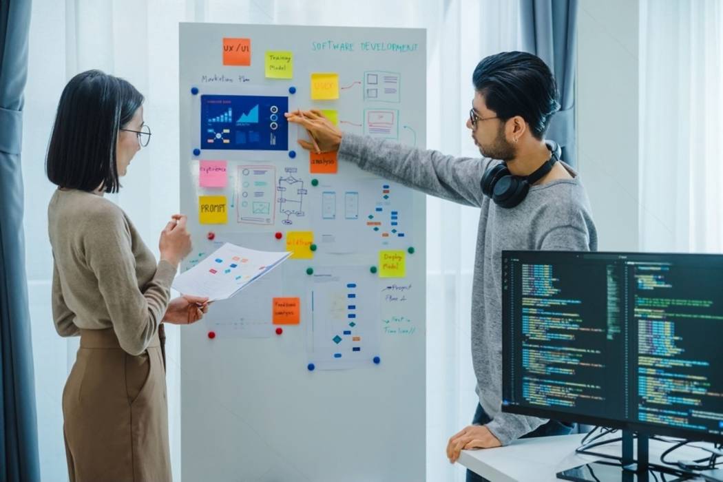 how-board-software-solutions-elevate-productivity Directors using a board portal to streamline agendas, voting, minutes, and actions